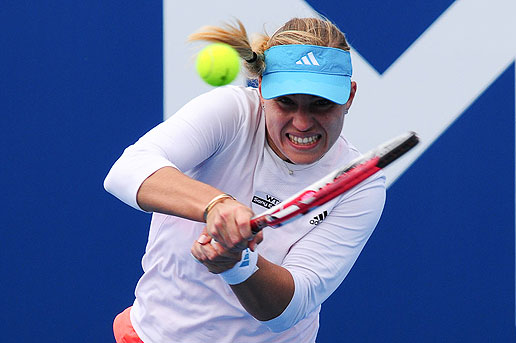 Kerber first through to semis