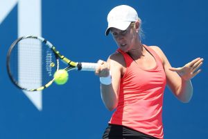 HOBART, AUSTRALIA - JANUARY 04:  Jessica Moore of Australia plays a forehand in her qualifying singles match against Ying-Ying Duan of China during day one of the Hobart International at Domain Tennis Centre on January 4, 2013 in Hobart, Australia.  (Photo by Mark Metcalfe/Getty Images)