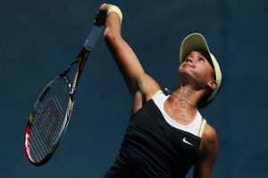 HOBART, AUSTRALIA - JANUARY 04:  Lauren Davis of USA serves in her qualifying singles match with Yue-Yue Hu of China during day one of the Hobart International at Domain Tennis Centre on January 4, 2013 in Hobart, Australia.  (Photo by Mark Metcalfe/Getty Images)