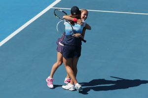 Klara Zakopalova and Monica Niculescu embrace after winning their second doubles title in as many weeks. Picture: Getty Images
