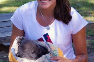 Monica Puig cuddles a wombat