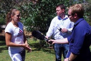 Monica Puig answers press questions