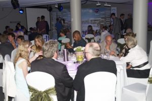 Guests enjoy a meal during the draw ceremony at The Old Woolstore in Hobart