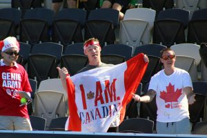 These fans weren't afraid to show their colours when Eugenie Bouchard hit the court. Picture: Kaytie Olsen