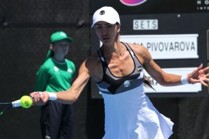 TAKE THAT: Russian Anastasia Pivovarova fires a forehand in her first round match.