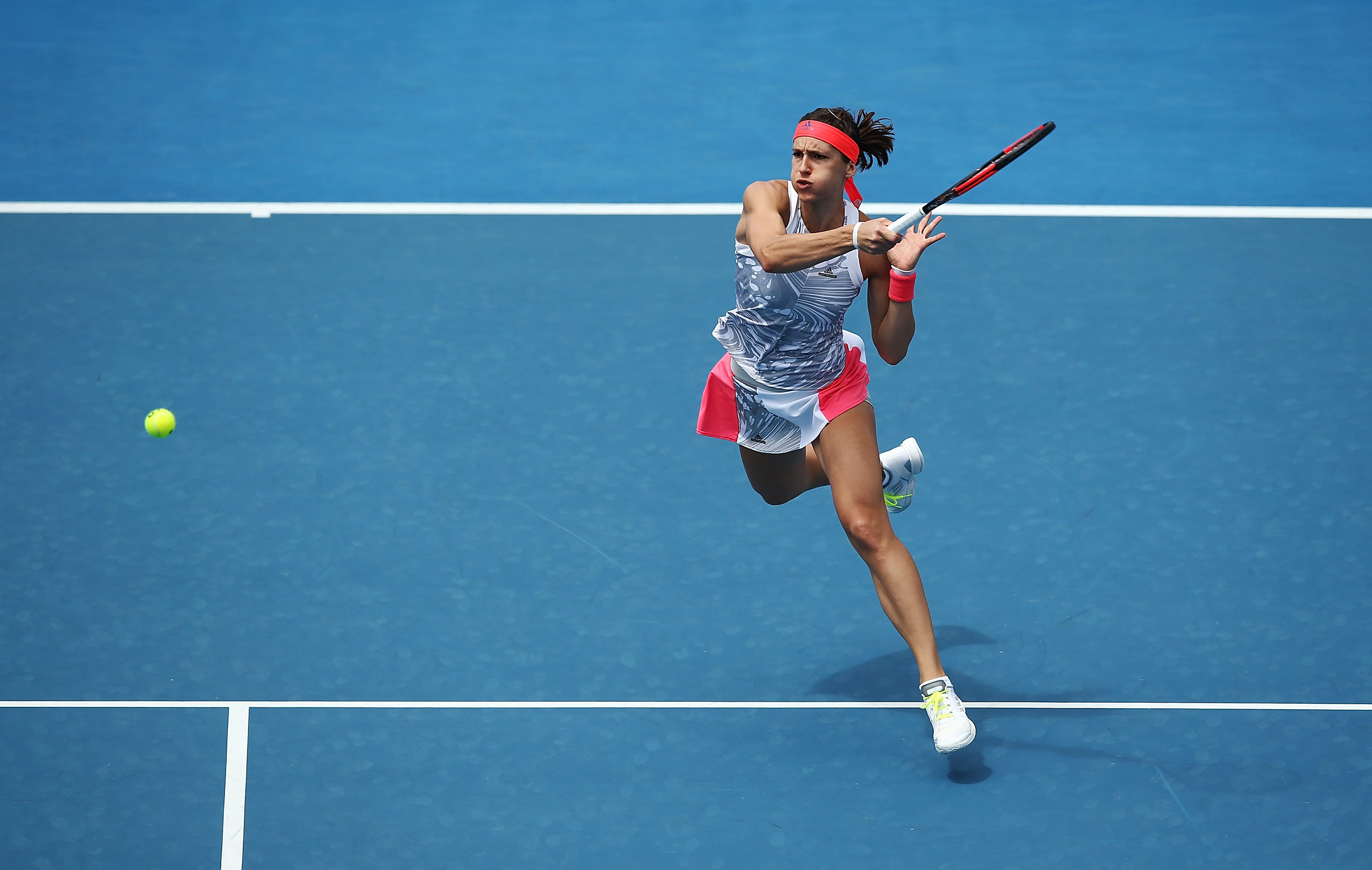 TAKE THAT:  German Andrea Petkovic fires a forehand in a see-sawing second round encounter on Centre Court; Getty Images