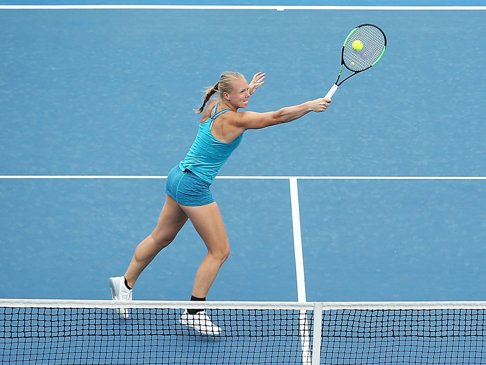 GOT THE TOUCH: Kiki Bertens volleys during a round one doubles match; Getty Images
