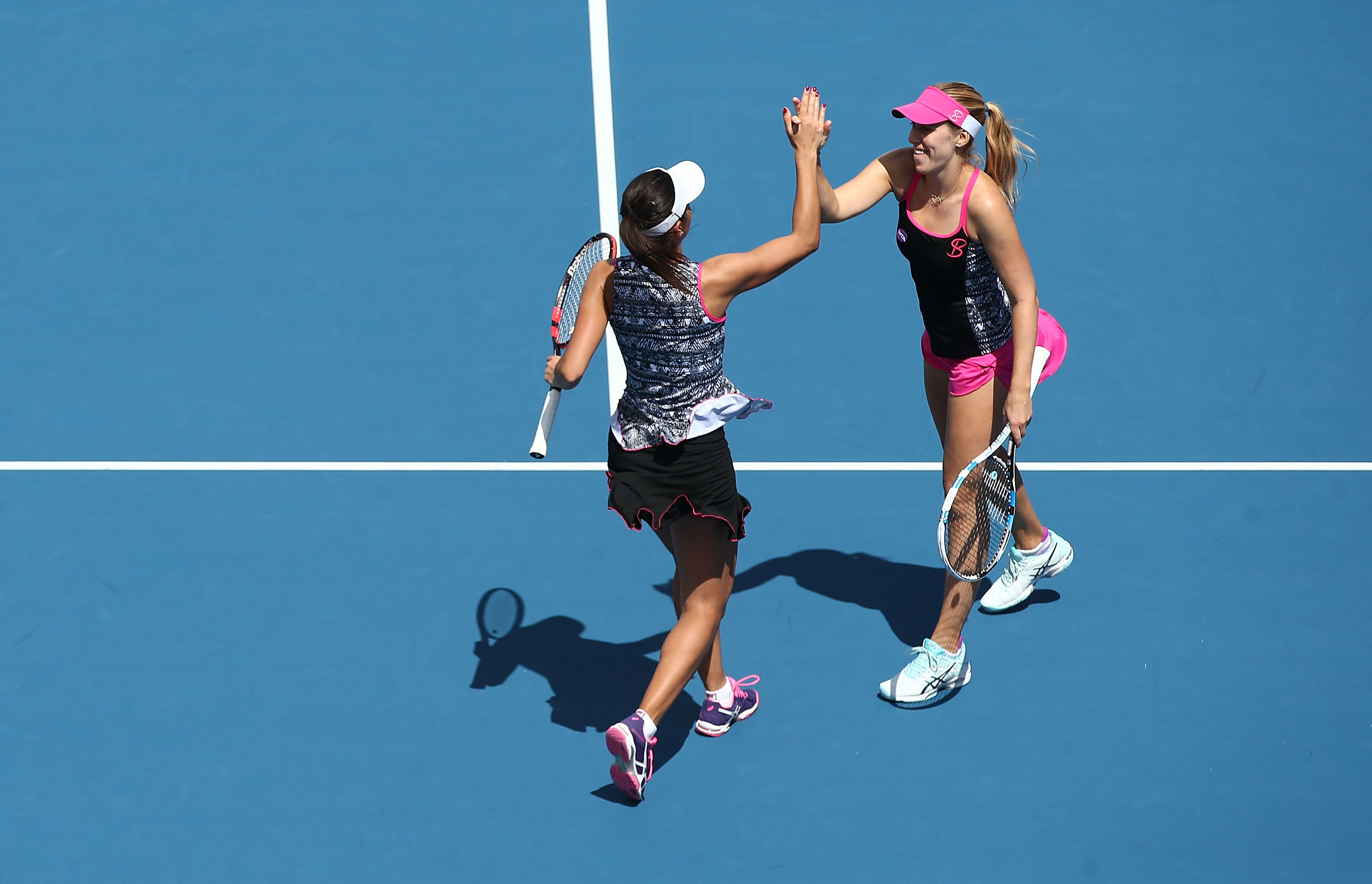 INTO THE FINAL:  Raluca Olaru of Romania and Olga Savchuk of Ukraine celebrate winning their doubles semifinal; Getty Images