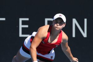 POWERING ON: Australian wildcard Ashleigh Barty in round one qualifying action. Photo: Tim Ikin