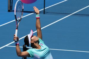 SERVING IT UP: Japan's Risa Ozaki serves during her round one qualifying win. Picture: Tim Ikin