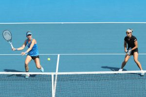 ON THE MOVE: Johanna Larsson and Kirsten Flipkens proved fierce competitors in the doubles final; Getty Images